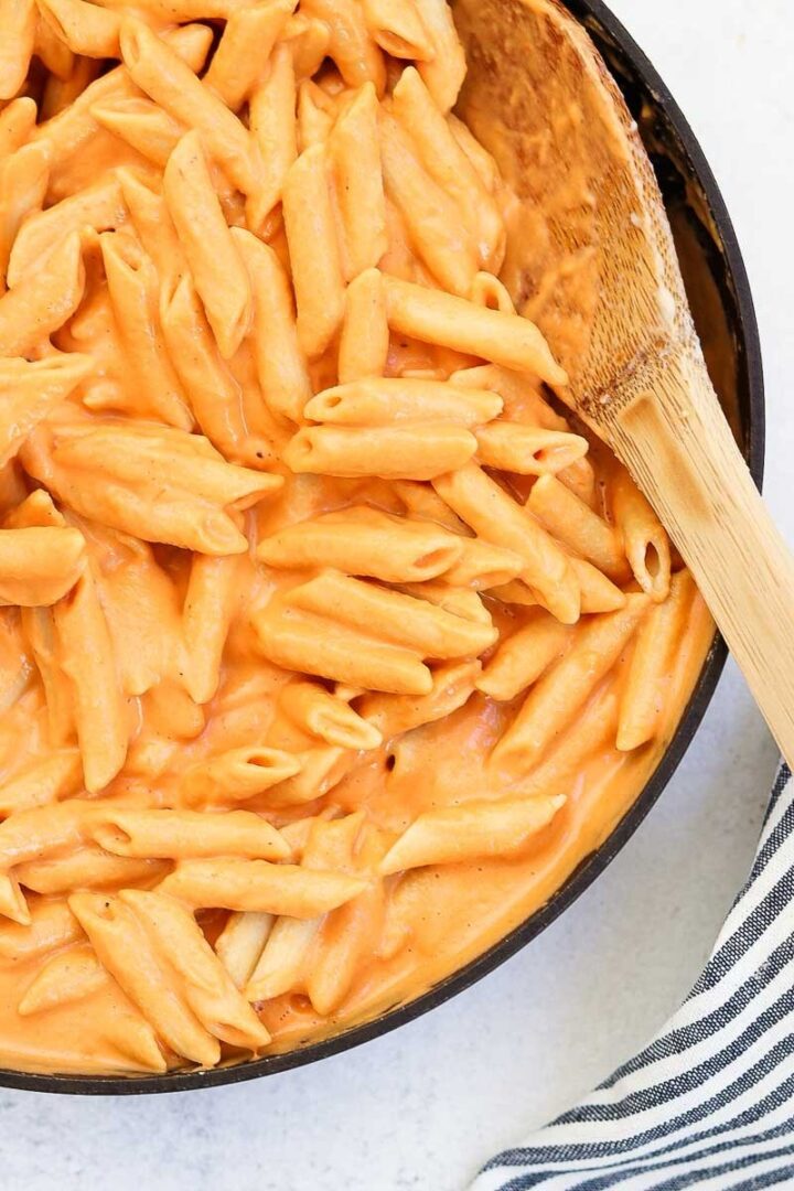 ROASTED RED PEPPER SAUCE OVER PASTA - roasted red peppers are balanced beautifully with cream and pamesan cheese for a luxurious sauce #sauce #happilyunprocessed