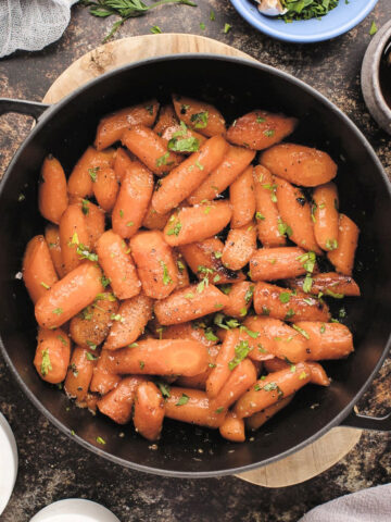 honey roasted carrots in cast iron pan