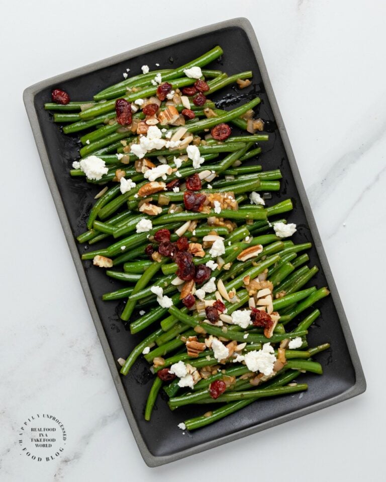 NOT YOUR MAMAS GREENBEANS - Fresh green beans topped with a Dijon Mustard Balsamic glaze, pecans, dried cranberries and feta cheese