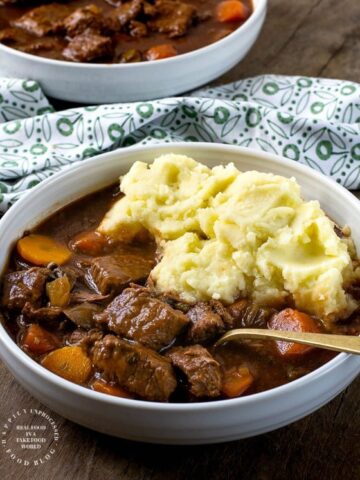 Traditional Irish Beef Stew with chunks of beef, carrots, onions, celery simmered in brown gravy #beef #stew #winterfood #healthy #happilyunprocessed