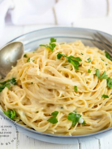 GARLIC PARMESAN NOODLES - One pot side dish with buttery garlic noodles and angel hair pasta #sidedish #pasta #weeknight #easyrecipe #happilyunprocessed