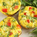 BREAKFAST EGG MUFFINS - a simple mixture of eggs, almond milk and your favorite veggies bakced in muffin tins for easy transport #egg #breakfast #mornings #cleaneating #happilyunprocessed