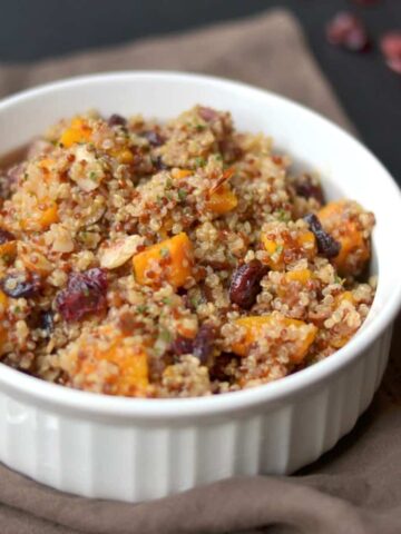 Roasted butternut squash and quinoa with craisins, slivered toasted almonds