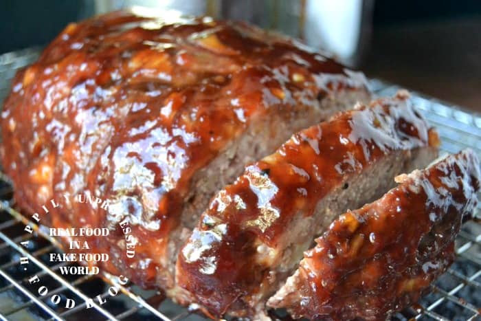 close up sliced meatloaf honey whiskey bbq glaze happily unprocessed