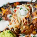 shredded chicken, cooked rice, corn, black beans, Mexican spices and melted cheese in one skillet