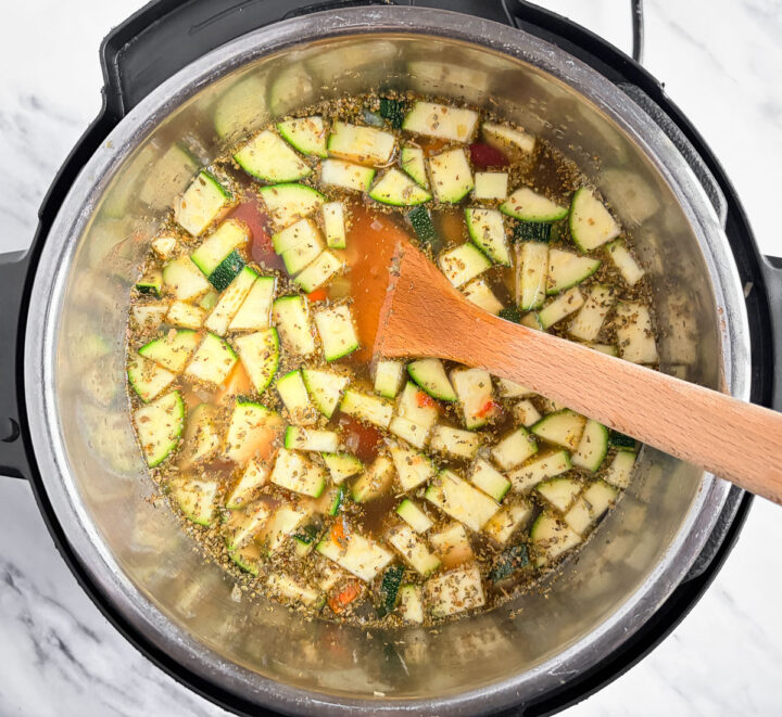 broth and vegetables in instant pot for minestrone soup