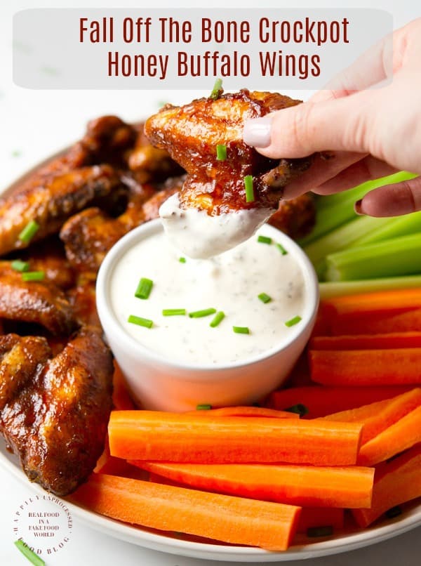 Fall off the Bone Crockpot Honey Buffalo Wings - no frying, no mess. Slow cooked until tender and finished under the broiler with a tangy, spicy, delicious honey buffalo sauce #chickenwings #wings #football #gameday #appetizers #happilyunprocessed