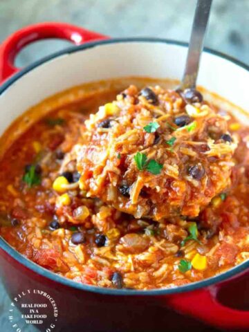 CHICKEN TORTILLA SOUP WITH RICE - perfect blend of Mexican spices, shredded chicken, corn, beans and rice for a filling bowl of soup #soup #chickentortilla #healthy #happilyunprocessed