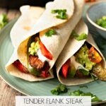 FLANK STEAK FAJITAS - perfectly grilled strips of flank steak with onions and peppers served with fresh tortillas, sour cream, guacamole and salsa #fajitas #happilyunprocessed