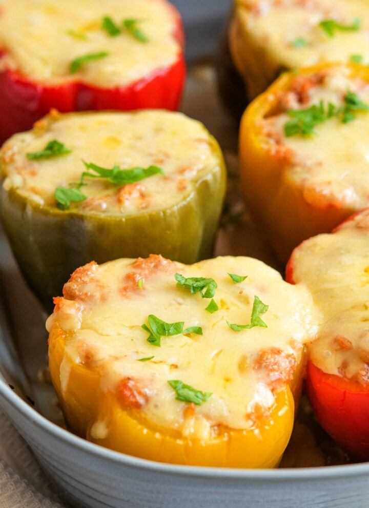 STUFFED PEPPERS WITH GROUND TURKEY AND CAULIFLOWER RICE - cutting back on red meat? These stuffed peppers are so delicious you may need to make more and freeze it #turkey #stuffedpeppers #weeknightdinner #happilyunprocessed.com