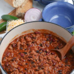 Weeknight Healthy Turkey Chili made in a Dutch oven is a great way to start the New Year off #turkeychili #chilirecipe #happilyunprocessed