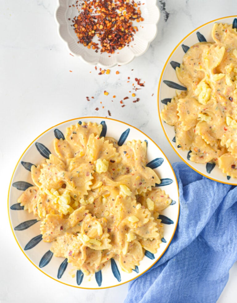 creamy pumpkin alfredo sauce over bowtie pasta