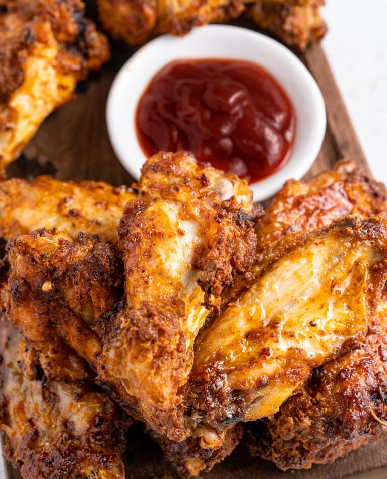 air fryer chicken wings with a side of bbq sauce