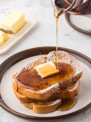 CINNAMON FRENCH TOAST WITH BUTTER AND MAPLE SYRUP