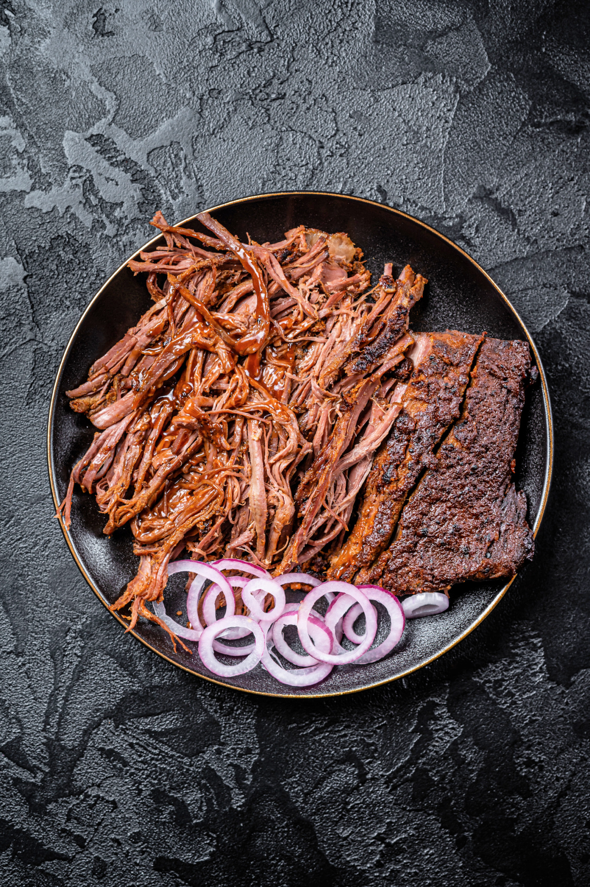 Pulled pork from from the oven and shredded with BBQ sauce