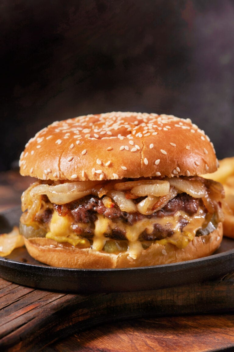 Fried onion smash burger on a sesame seed bun