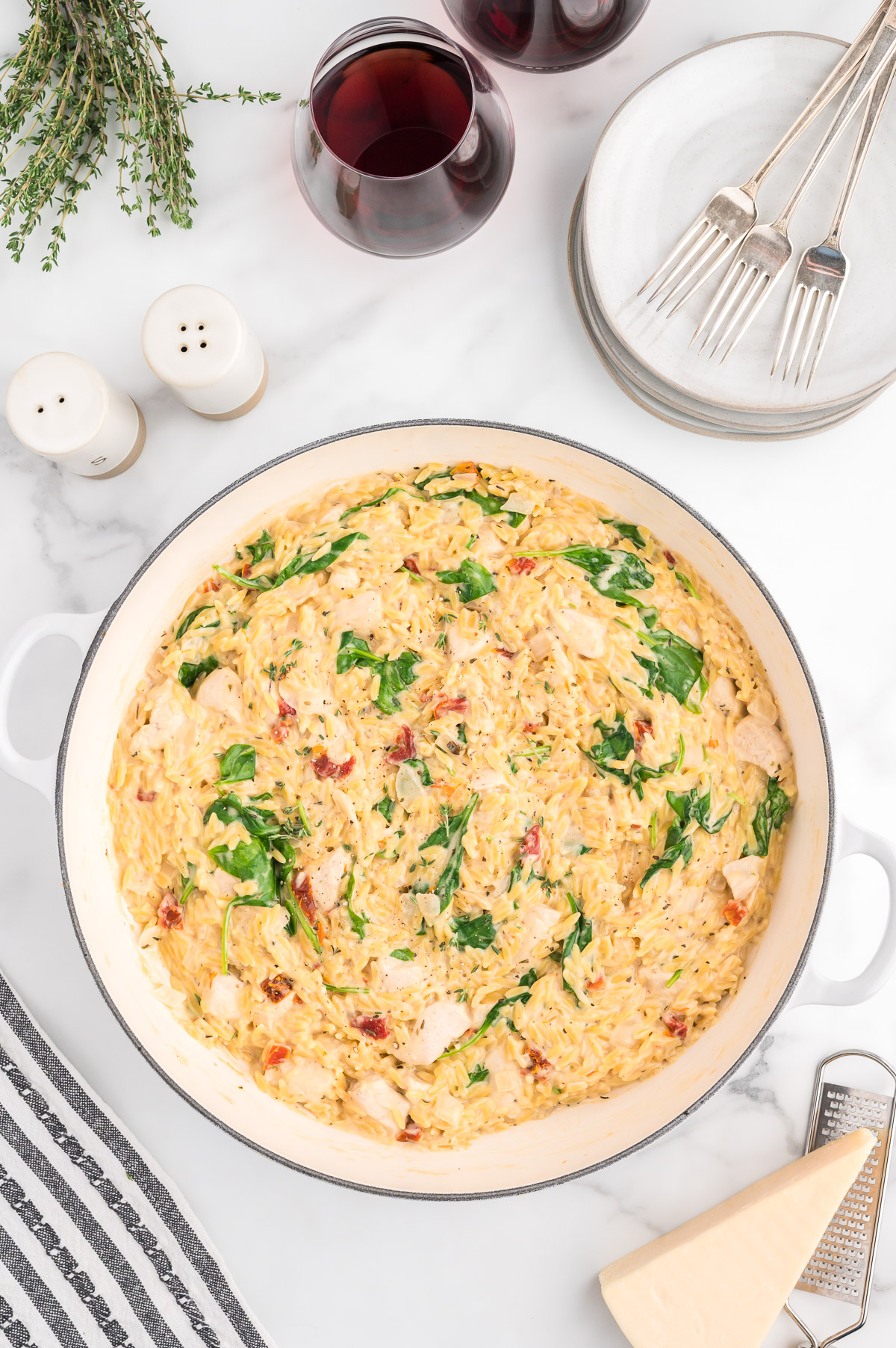 Creamy Parmesan orzo with fresh spinach and sundried tomatoes