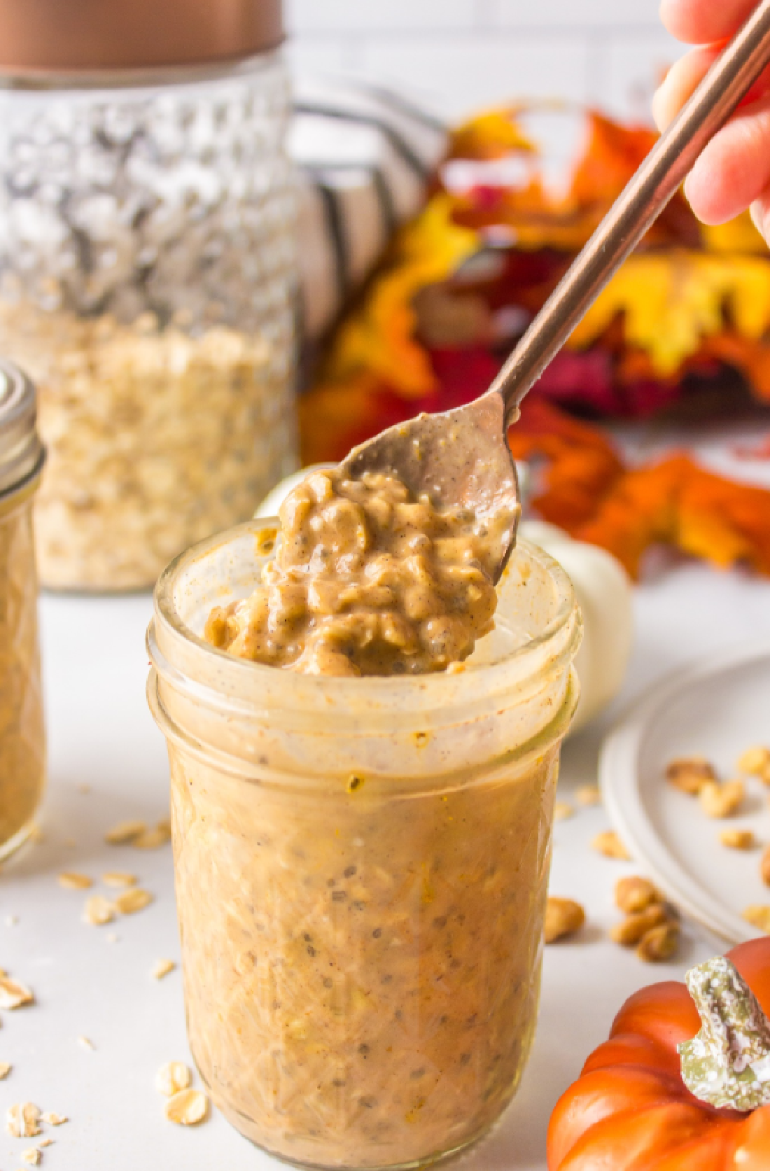 A spoonful of pumpkin spiced overnight oats is a healthy quick and convenient breakfast