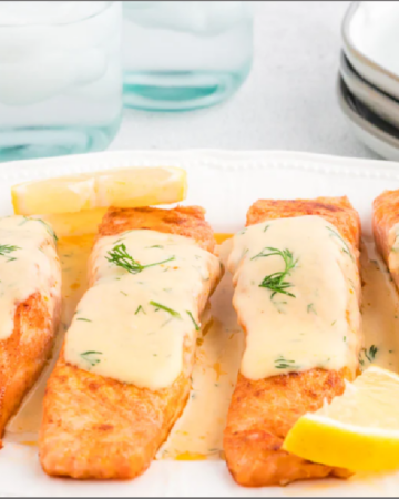 pan seared salmon in a creamy white wine and dill sauce