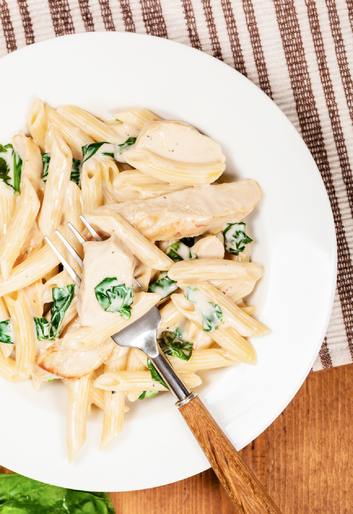 One skillet chicken alfredo with penne pasta and spinach