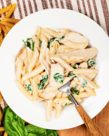 One skillet chicken alfredo with penne pasta and baby spinach