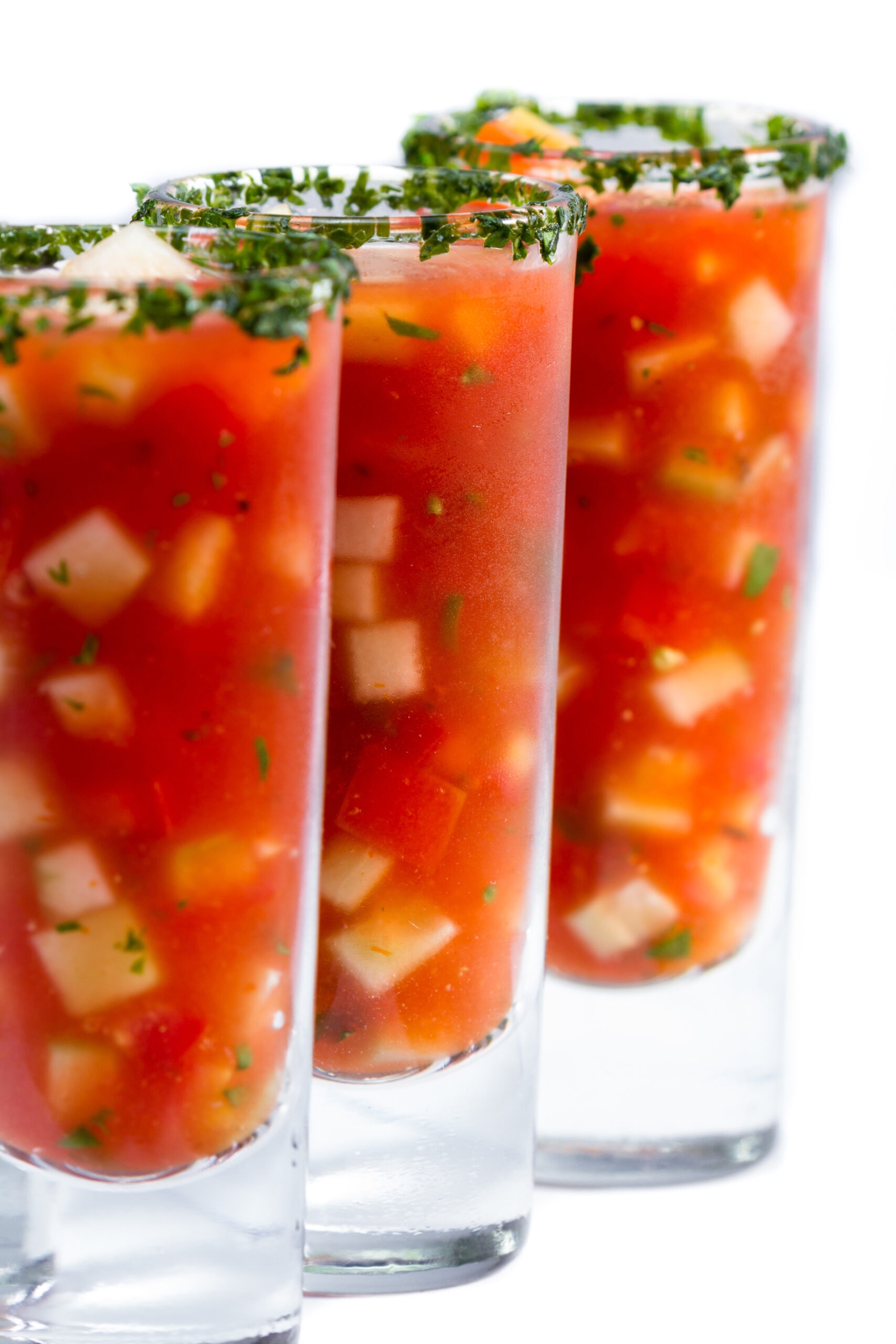 a tall glass of refreshing vibrant gazpacho for summer