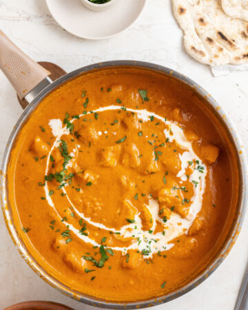 homemade chicken makhani (butter chicken) sauce in a pan with cream