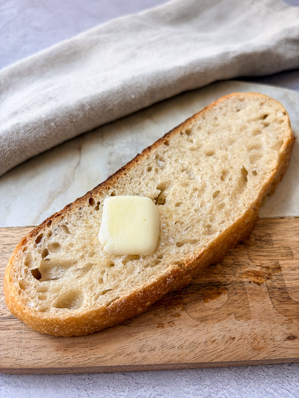 Sourdough bread slice with melted butter